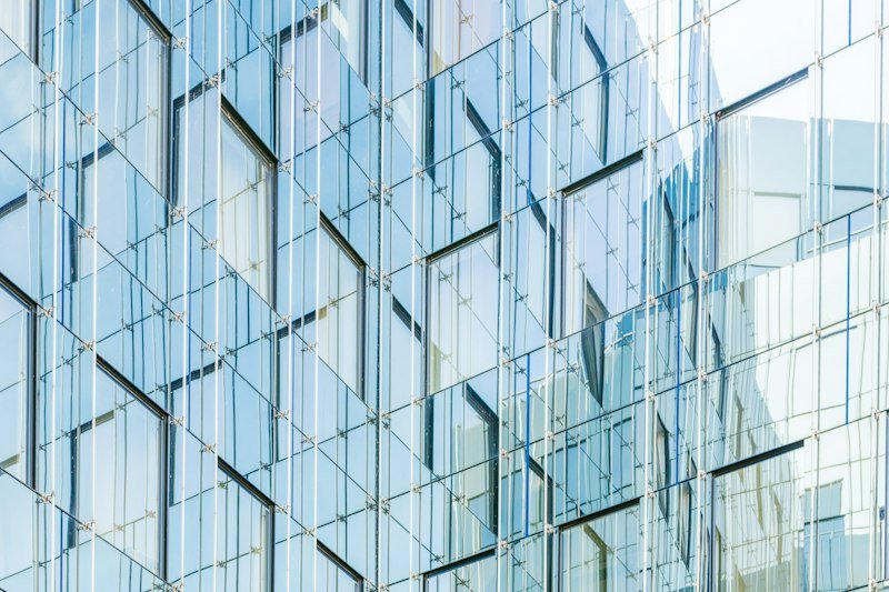 Glass facade of a modern banking-style office building